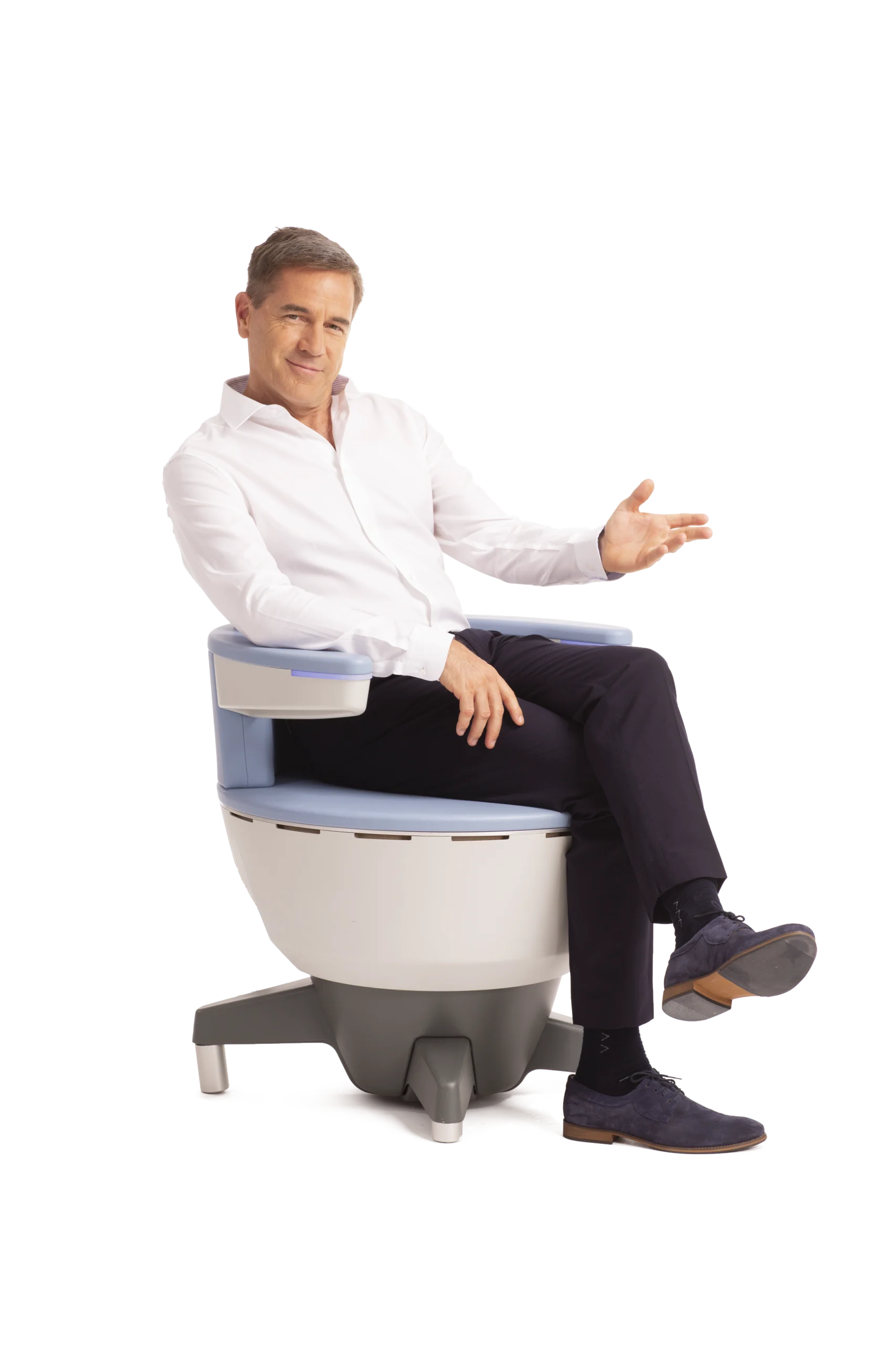 Man in white shirt seated on modern chair