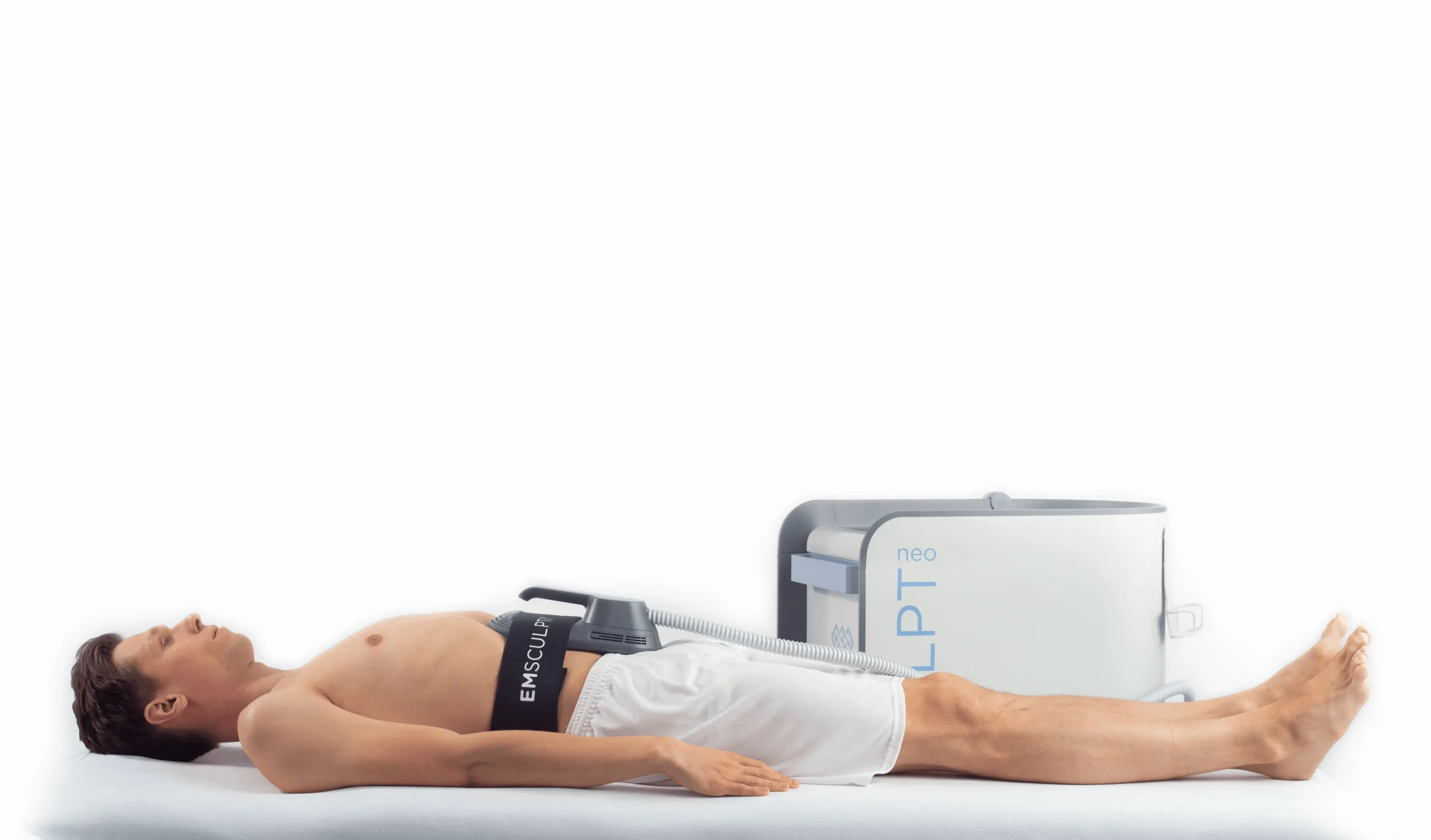 Man receiving abdominal Emsculpt body sculpting treatment