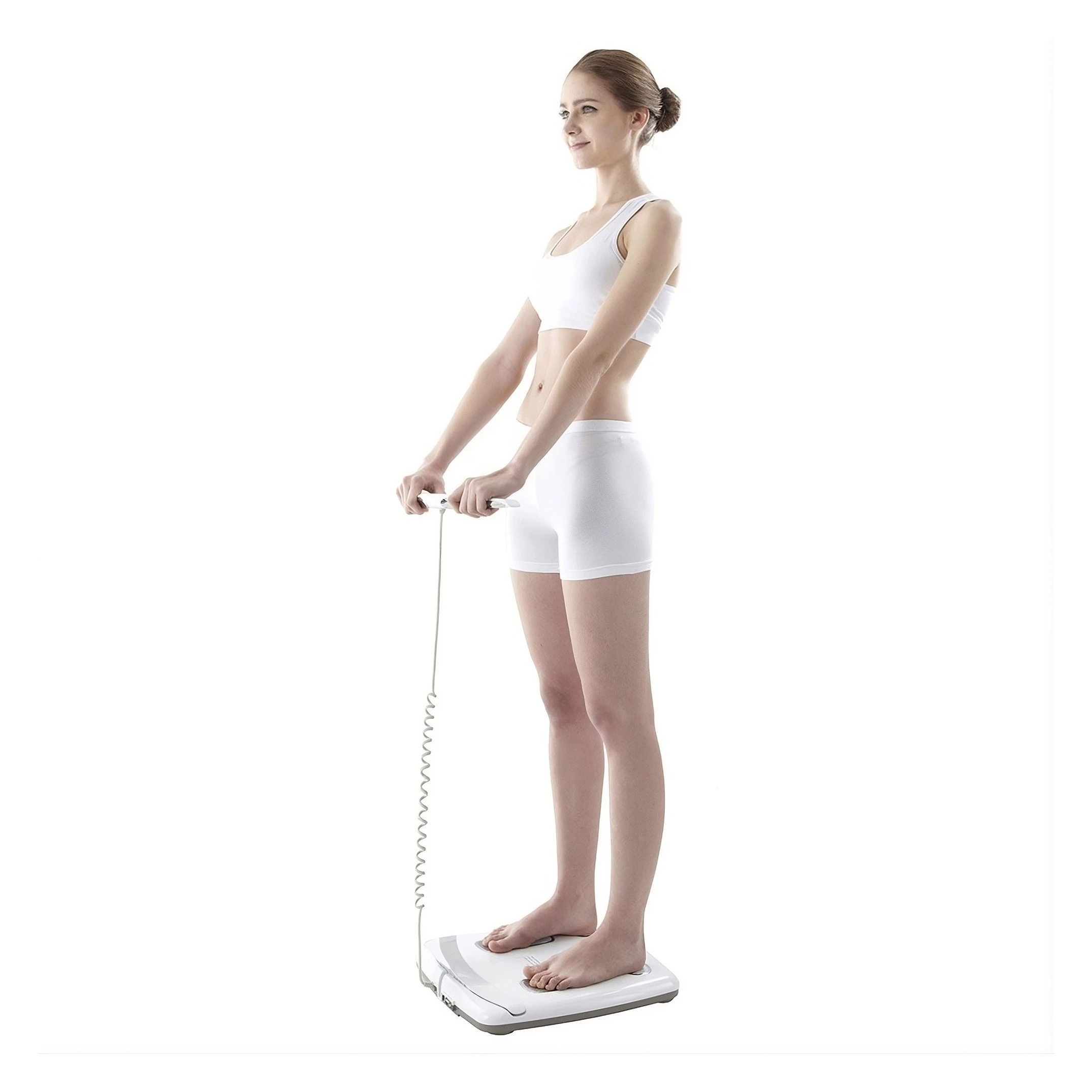 Young woman using digital body composition scale